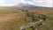 Aerial shots of Mt Tongariro and alpine stream with fresh water from the melting snow. Tongariro National Park. North