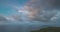Aerial sky cloud timelapse. Bright blue sky over island and ocean. Foggy landscape. Amazing nature