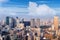 Aerial skyscraper view of office building and downtown and cityscapes of Tokyo city with blue sly and clouds background. Japan, A