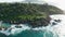 Aerial slider above end of Anse Cocos beach of east part of La Digue