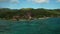 Aerial slider view to Anse Source d`Argent in the shadow of the clouds