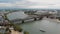 Aerial slow left pan of the Rhine River and cityscape of Cologne, Germany.