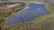 Aerial. Solar panels in the field, green alternative energy in Spain.