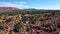 Aerial southwest red rock desert cliff beautiful Kanab Utah pull 4K