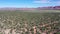 Aerial southwest red rock desert cliff cedar trees Kanab Utah 4K