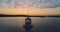 Aerial spectacular sunset view of sea, coastal lighthouse and sea port Varna, Bulgaria. Coastal beacon.