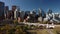 Aerial spin of a downtown Canadian city and historic bridge.