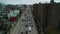 Aerial static shot of vehicles driving on busy trunk road. Heavy traffic on elevated multilane highway in city at rush
