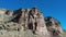 Aerial steep desert mountain cliff Nine Mile Canyon Utah 4K