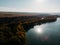 Aerial stock footage of beautiful autumn landscape at sunset lakes and rivers