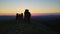 Aerial: Stone pillars of weathering on Mount Manpupuner at dusk