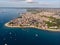 Aerial. Stone town, Zanzibar, Tanzania. Flock of Show Ships near the Zanzibar Coastline in Stone Town on Blue