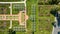 Aerial straight down shot over trellises with pools in garden at Lakeside Park