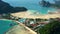 AERIAL Stunning shot of tropical island harbor on a refreshing tranquil morning. Moored boats and ferries wait for crowds of