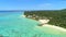 AERIAL: Stunning view of luxury hotel surrounded by lush tropical vegetation.