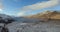 Aerial: Stunning view of Scottish lake in Highlands during winter, North Scotland