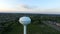 Aerial suburban Ohio water tower tight