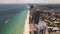 Aerial Sunny Isles Beach FL with view of Miami Biscayne Bay. 5k drone clip