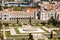 Aerial sunny view of Praca do Imperio in Lisbon, with Museu de Marinha in the back