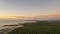 Aerial Of Sunrise On The Beach At Low Tide