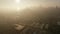Aerial Sunrise misty view over Wharf to Coit Tower with downtown San Francisco and the Bay Bridge in the background