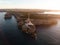 Aerial sunrise panorama of Cabo de Sao Vicente Cape St Vincent mediterranean Algarve cliff atlantic coast beach Sagres