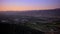 Aerial sunset above the Hollywood Hills approaching Burbank, California