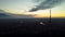 Aerial sunset dark city view with telecom tower