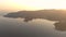 Aerial sunset drone footage of the rugged coastline of the east side of Vancouver Island.