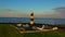 Aerial sunset The St. John`s Point Lighthouse in Northern Ireland