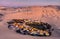 Aerial sunset view of the Huacachina Oasis in Peru