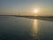 Aerial sunset view of ilha do Farol lighthouse island, Portugal.