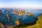 Aerial sunset view of Lan Ha bay and Cat Ba island, Vietnam, unique limestone rock islands and karst formation peaks in the sea,