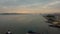 Aerial sunset view on River Tagus with 25 de Abril bridge 25th of April Bridge.