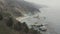 Aerial, sweeping shot of Big Sur coastline in California