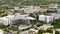 Aerial telephoto video Aventura hotels and hospital parallax 3x zoom clip