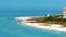 Aerial telephoto zoom shot Sarasota Beach Florida Gulf of Mexico coast 4k