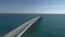 Aerial three quarters shot of a pier in the mediterranean sea