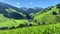 Aerial timelapse of Hinterglemm village and mountains in Saalbach-Hinterglemm skiing region in Austria on a beautiful