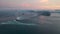 Aerial timelapse: Strong tidal current under Naruto Bridge at sunset