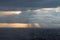 Aerial of Tokyo suburb cityscape with picturesque clouds and sunrays at sunset