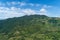 Aerial top down mountain Texture of nature forest scenery view Rainforest in sunny day