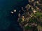 Aerial top down of natural erosion rock formation limestone cliff coast at Praia do Camilo beach Lagos Algarve Portugal