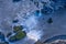 The aerial top down view of the beautiful waterfall of Godafoss at link sunset, Iceland in the summer season