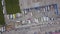 Aerial top down view of Cargo trucks, Containers and Distribution Warehouse.