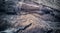 Aerial top down view on dried river Rio Grande basin on Nazca desert in between mountains.