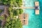 Aerial top down view from drone of a luxurious tropical island paradise resort