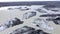 Aerial top down view with drone over the of icebergs floating in Svinafellsjokull lake, Vatnajokull National Park, Iceland