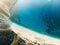 Aerial top down view of Myrtos beach, the most famous and beautiful beach of Kefalonia, a large coast with turqoise water and