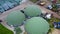 Aerial top down view over biogas production plant. Obtaining biogas, biomethane.